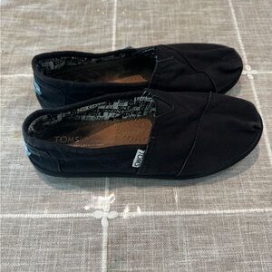 TOMS Classic Black Canvas Slip-Ons